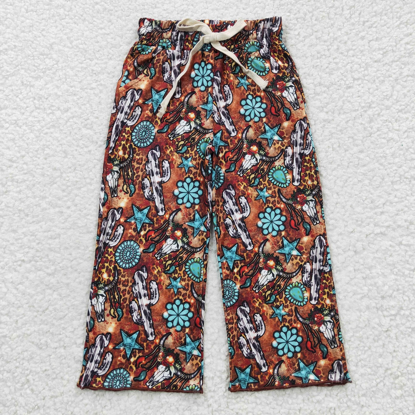 P0139 Turquoise cow skull leopard print western pants